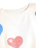 Felpa per bambina Molo Kids bianca con applicazioni a cuore con paillettes 2W26J209 5773 MOLO KIDS 