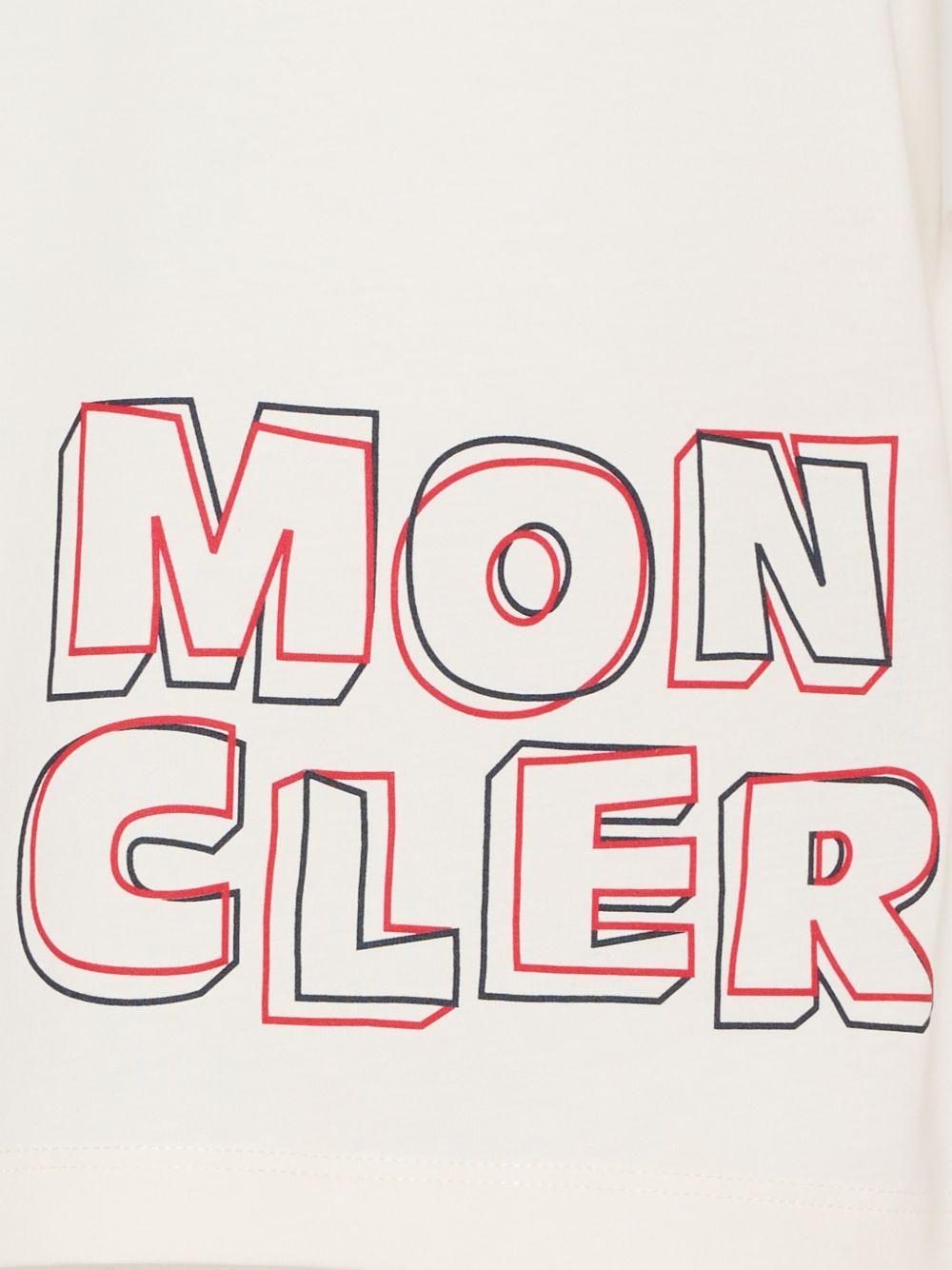 T-shirt per bambino Moncler Enfant bianca con stampa logo sul davanti L19548C0000689AFV 034 MONCLER KIDS 