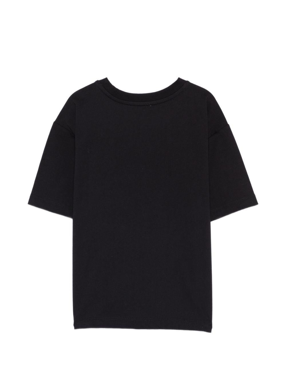 T-shirt per bambini Moschino Kids nera con logo sul davanti HUM05QLAA24 60100 MOSCHINO KIDS 