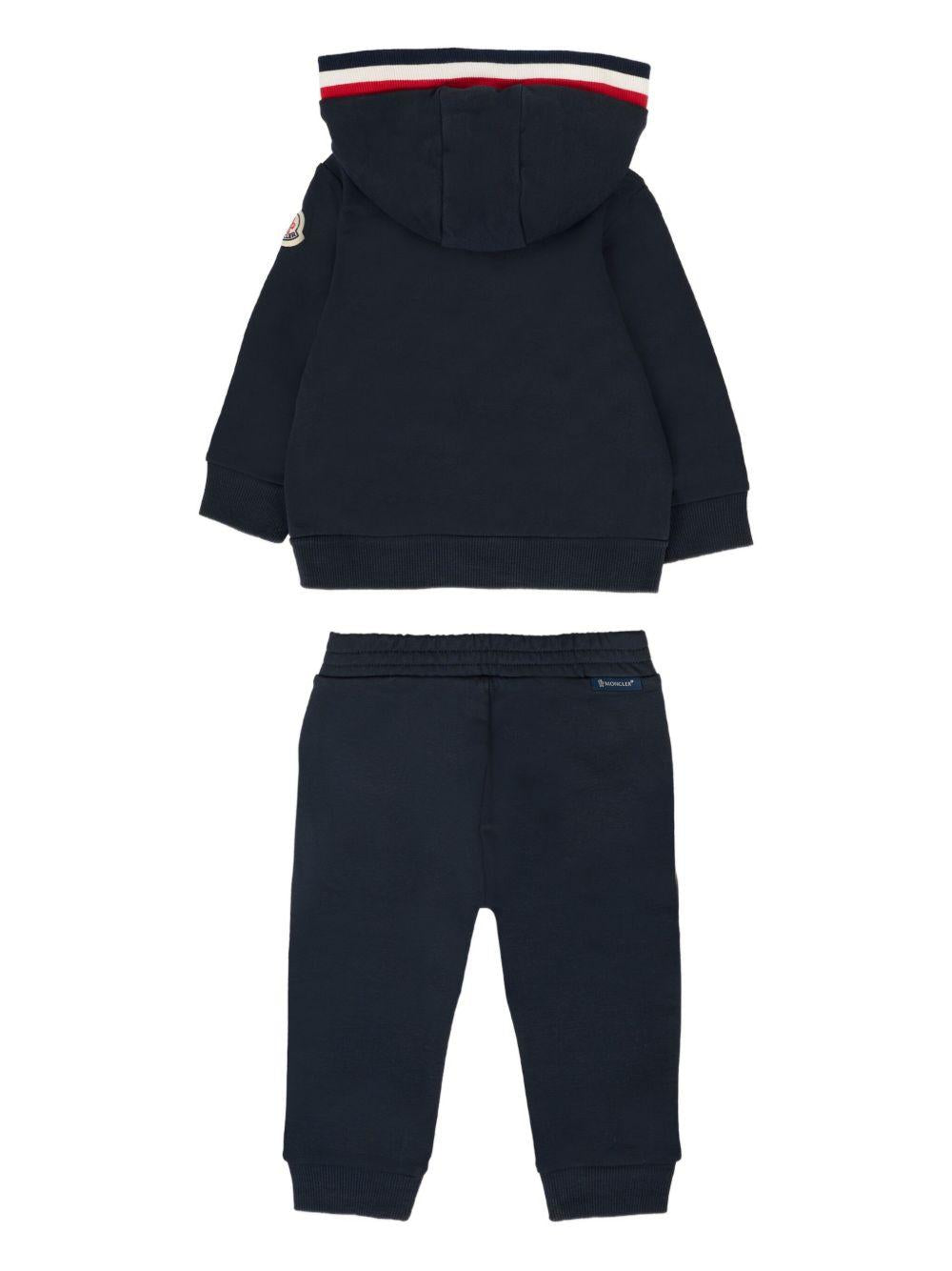 Tuta sportiva per neonato Moncler Enfant blu con cappuccio K29518M0000789AM3 778 MONCLER ENFANT 