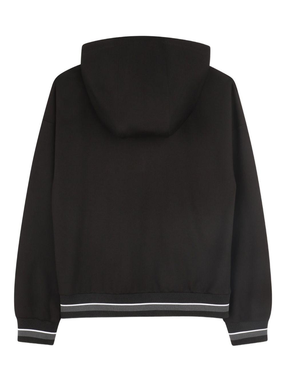 Felpa per bambini Dkny Kids nera con cappuccio e zip D62430 09B DKNY 