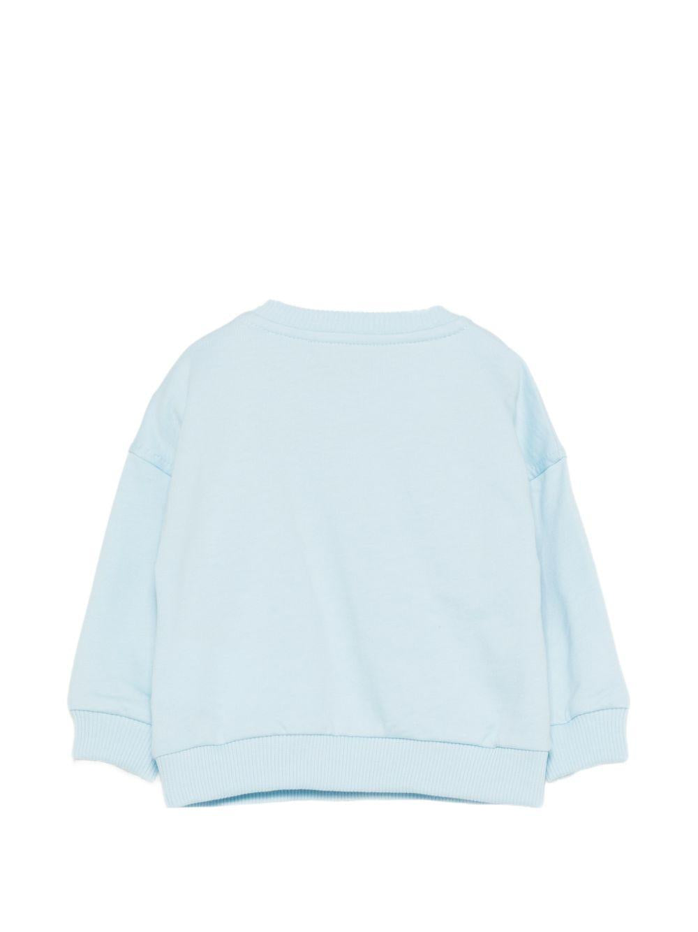 Felpa per neonati Moschino Kids azzurra con stampa grafica Teddy Bear MUF069LCA19 40304 MOSCHINO KIDS 