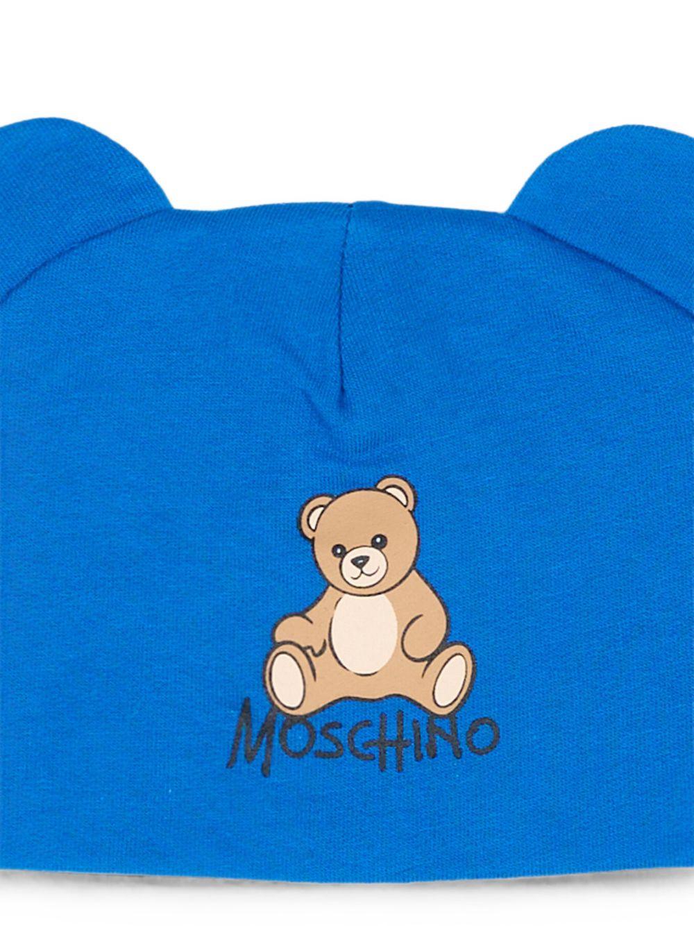 Berretto per neonati Moschino Kids blu con motivo Teddy bear MMX05HLCA40 40157 MOSCHINO KIDS 