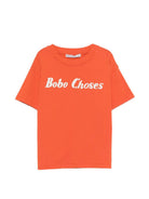 T-shirt per bambino Bobo Choses arancione con scritta logo sul davanti B126AC016 811 BOBO CHOSES KIDS 