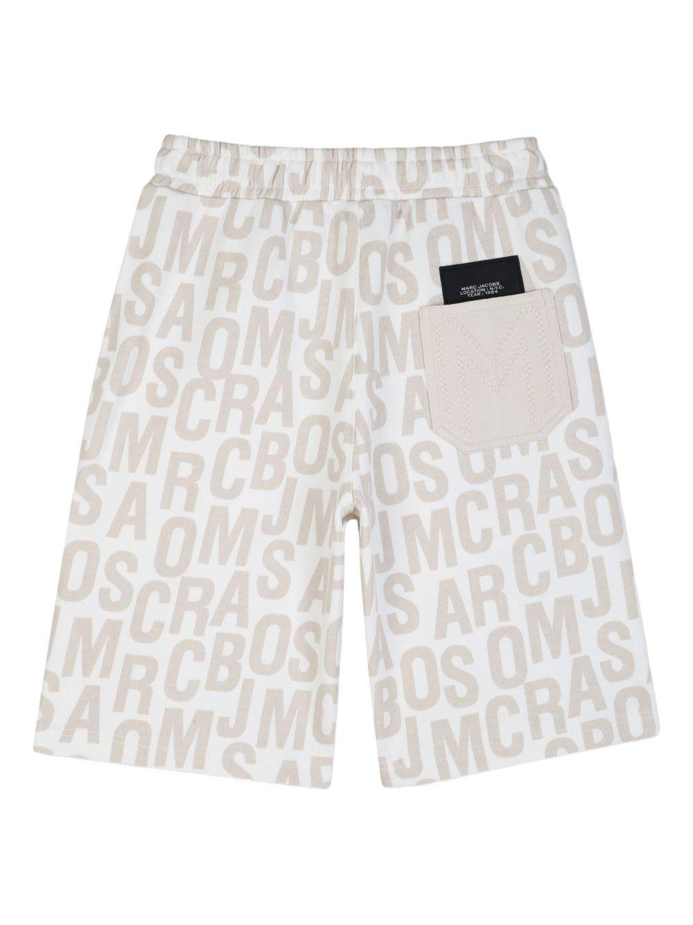 Shorts per bambino The Marc Jacobs Kids con stampa beige chiaro logo all-over W60783 126 THE MARC JACOBS KIDS 