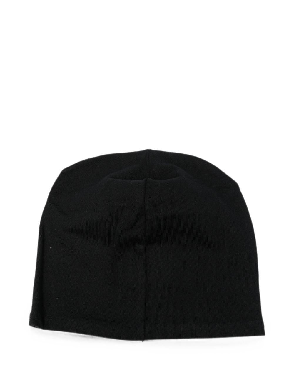 Berretto per bambino Moschino Kids nero con stampa grafica HNX02MLCA94 60100 MOSCHINO KIDS 