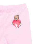 Leggins per neonata Moschino Kids rosa con dettaglio Teddy Bear con cuore MIP032LBA00 51473 MOSCHINO KIDS 