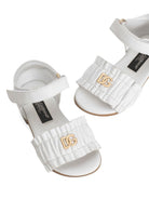 Sandali per bambina Dolce & Gabbana Kids bianchi con logo color oro D20113 A1850 80001 DOLCE & GABBANA KIDS 