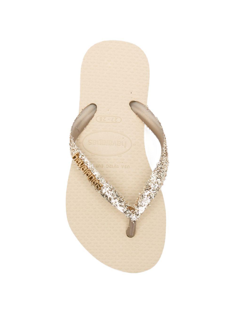 Infradito per bambina Havaianas Kids oro con dettagli glitterati 4146975 0154 HAVAIANAS KIDS 
