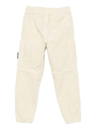 Pantaloni per bambino Stone Island Junior beige in velluto a coste con tasche applicate K2S163100005S0199 V0093 STONE ISLAND JUNIOR 