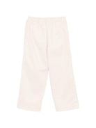 Pantatuta Palm Angels Kids bianco crema con stampa  del logo sul davanti PBCJ002S26FAB001 092 PALM ANGELS KIDS 