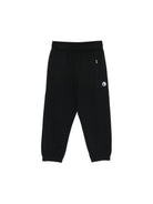 Pantaloni sportivi per bambino Molo neri con motivo basketball 1S26I203 0099 MOLO KIDS 