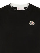 T-shirt per bambino Moncler Enfant nera con dettaglio logo L29548C0000889AFV 999 MONCLER KIDS 