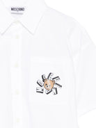 Camicia per bambino Moschino Kids bianca con stampa grafica sul petto HUC01WLLA10 10101 MOSCHINO KIDS 