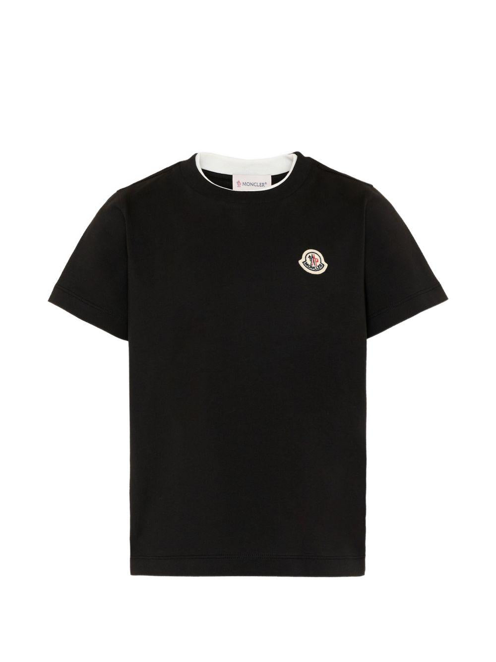 T-shirt per bambino Moncler Enfant nera con dettaglio logo L29548C0000889AFV 999 MONCLER KIDS 