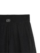 Pantaloni per bambina DKNY Kids neri con placca logo D62580 09B DKNY KIDS 
