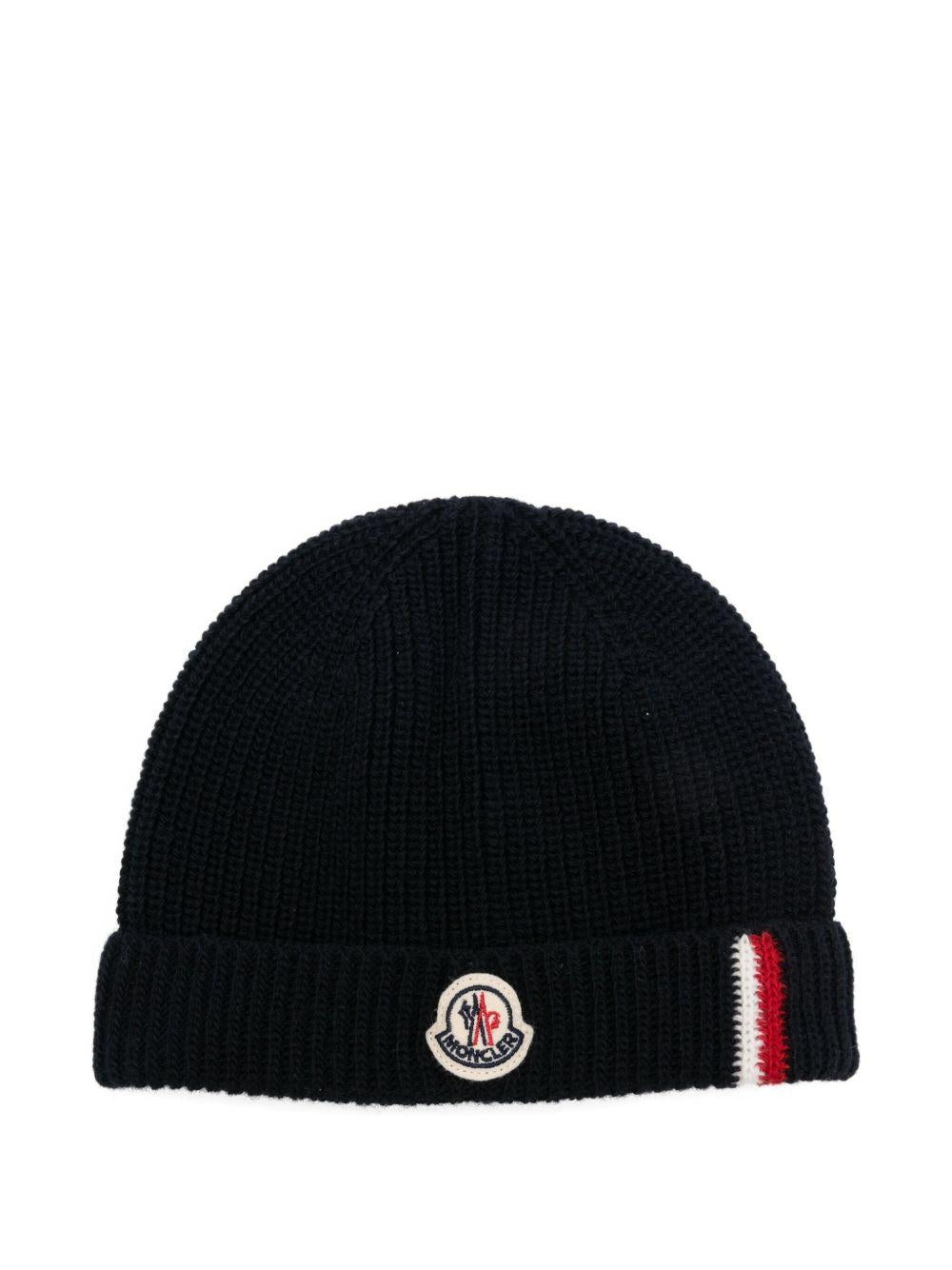Berretto per neonato Moncler Enfant blu a coste con applicazione K29513B00013M1241 742 MONCLER KIDS 