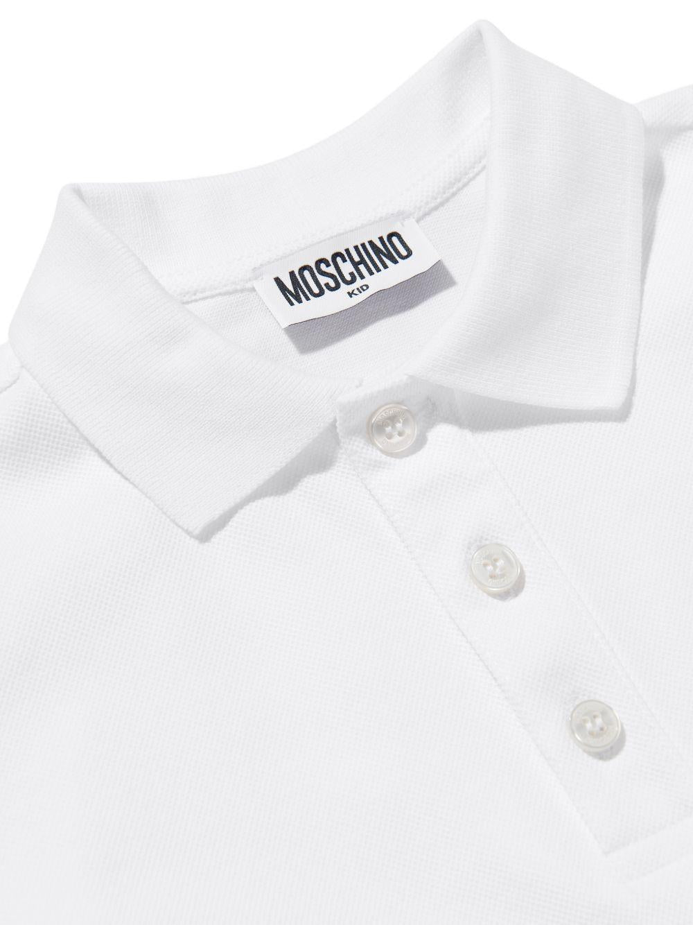 Polo da bambino Moschino Kids bianca con stampa orsacchiotto HSM03YLFA09 10101 MOSCHINO KIDS 