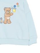 Felpa per neonati Moschino Kids azzurra con stampa grafica Teddy Bear MUF069LCA19 40304 MOSCHINO KIDS 