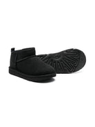 Stivali Ultra Mini per bambina UGG Kids neri con finitura idrorepellente<BR/> 1130750K BLK UGG 