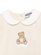 Tutina per neonati Moschino Kids beige con stampa grafica Teddy Bear MUY093LAA03 20404 MOSCHINO KIDS 