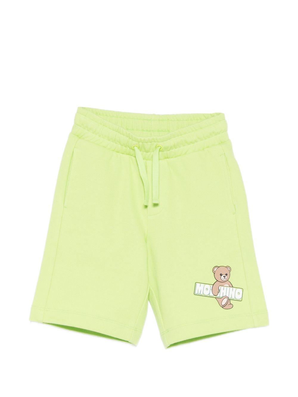 Shorts per bambino Moschino Kids verde con stampa grafica HUQ02LLCA90 30355 MOSCHINO KIDS 