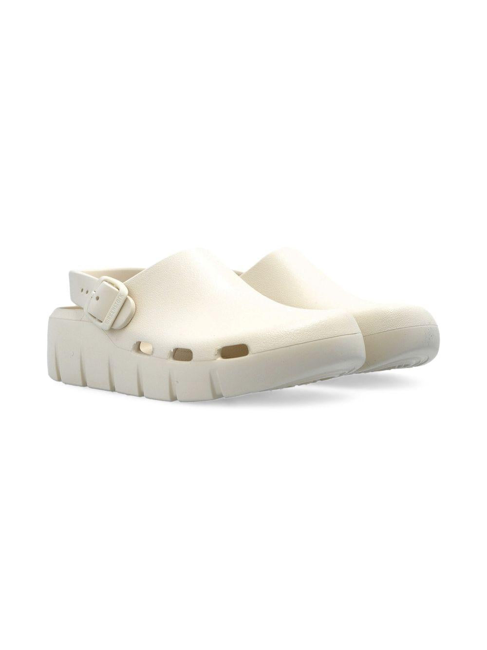 Sandali per bambini Birkenstock Kids Birki Flow beige con cinturino alla caviglia 1029567 EGGSHELL BIRKENSTOCK KIDS 
