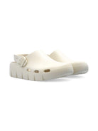 Sandali per bambini Birkenstock Kids Birki Flow beige con cinturino alla caviglia 1029567 EGGSHELL BIRKENSTOCK KIDS 
