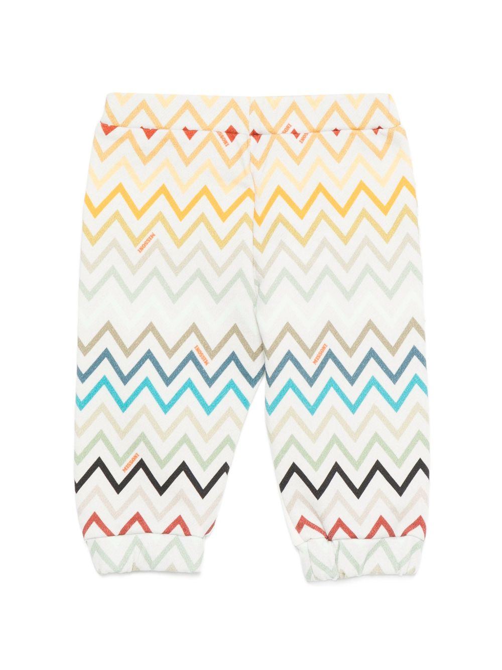 Pantaloni sportivi per neonato Missoni Kids bianchi con motivo a zigzag MZ6300 Z3183 102MC MISSONI KIDS 