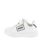 Sneakers per bambino BOSS Kids bianche con applicazione con logo J52573 10P BOSS KIDS 