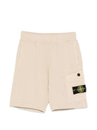 Shorts per bambino Stone Island Junior beige con applicazione logo sul davanti L1S166200008S0040 V0090 STONE ISLAND KIDS 