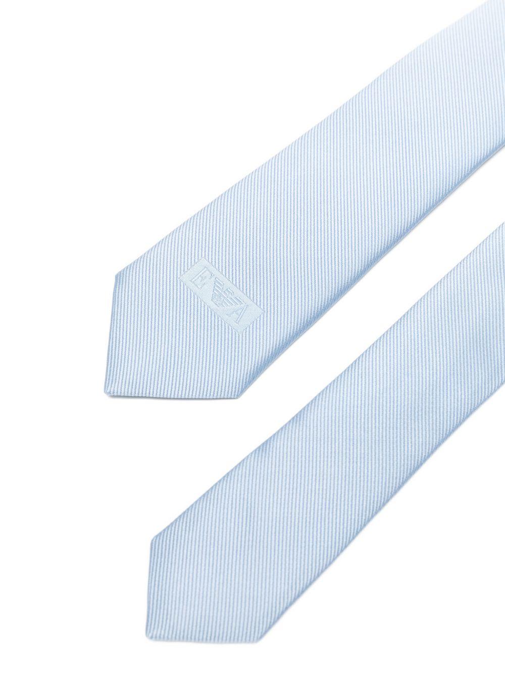Cravatta per bambino Emporio Armani Kids azzurro con dettglio logo EB000843 AF23749 U9360 EMPORIO ARMANI KIDS 