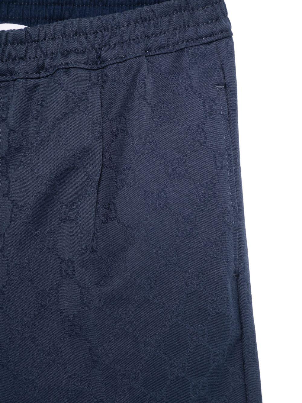 Pantaloni per bambino Gucci Kids blu con logo GG in cotone 804419 XWA3G 4843 GUCCI KIDS 