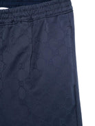 Pantaloni per bambino Gucci Kids blu con logo GG in cotone 804419 XWA3G 4843 GUCCI KIDS 