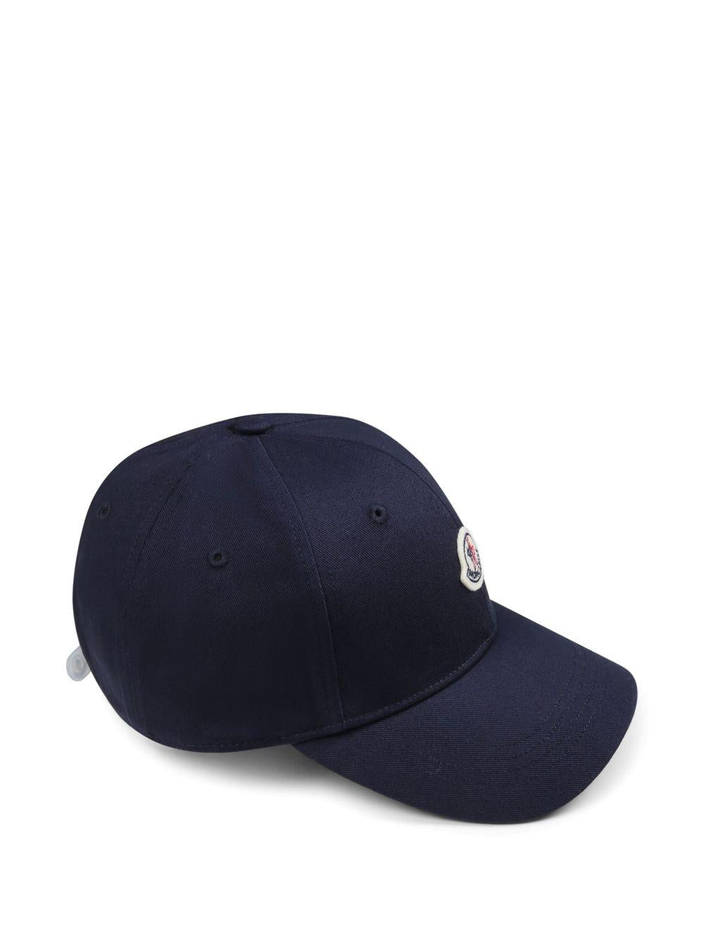 Cappello per bambino Moncler Enfant blu con occhielli L19543B0001704863 742 MONCLER ENFANT 
