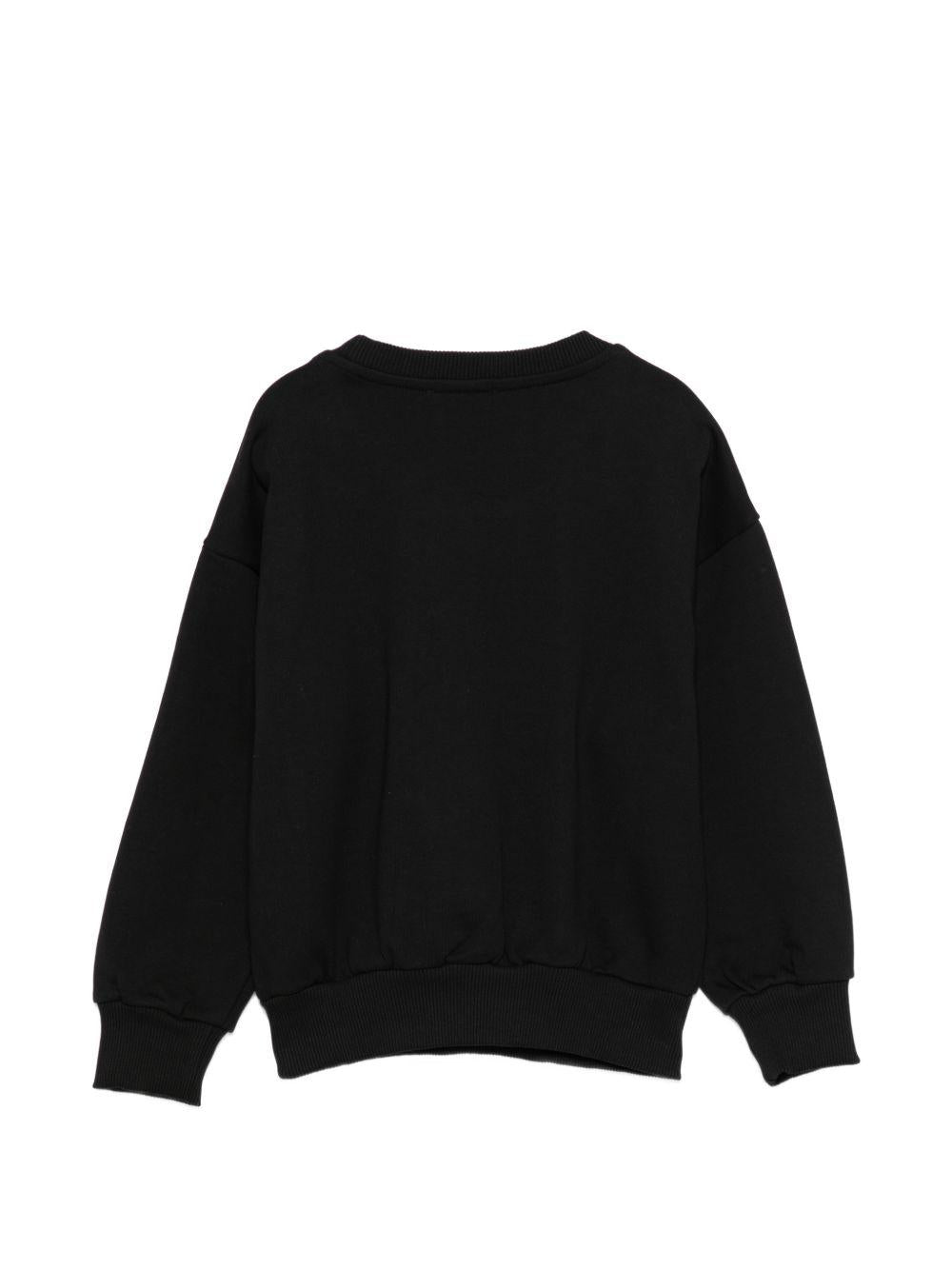 Felpa per bambino Moschino Kids nera con stampa logo HUF09NLCA32 60100 MOSCHINO KIDS 