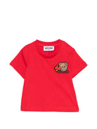 T-shirt per neonati Moschino Kids rossa con dettagli in rilievo MVM047LAA24 50109 MOSCHINO KIDS 