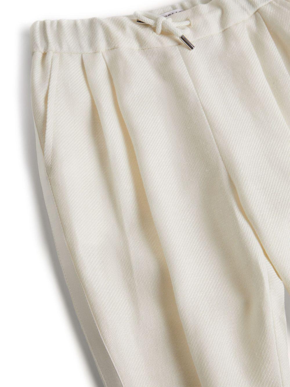 Pantaloni slim con coulisse per bambino Brunello Cucinelli Kids bianco con taglio slim BW482S502 C601 BRUNELLO CUCINELLI KIDS 