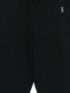 Pantaloni sportivi per bambino Molo neri con motivo basketball 1S26I203 0099 MOLO KIDS 