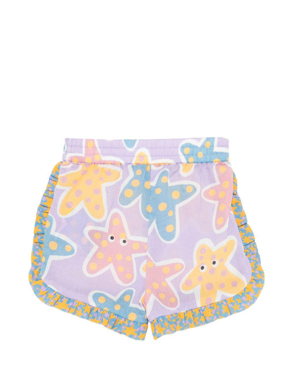 Shorts per neonata Stella McCartney Kids viola con stampa stelle marine all-over TY6069 Z3603 539MC STELLA McCARTNEY KIDS 