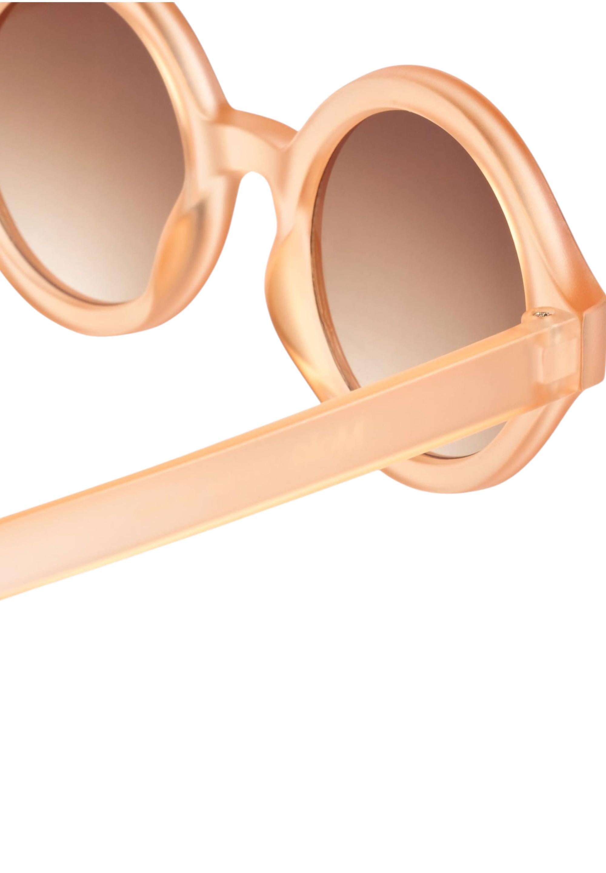 Occhiali da sole per bambina Molo arancioni con rifinitura satinata 7S26T506 5604 MOLO 