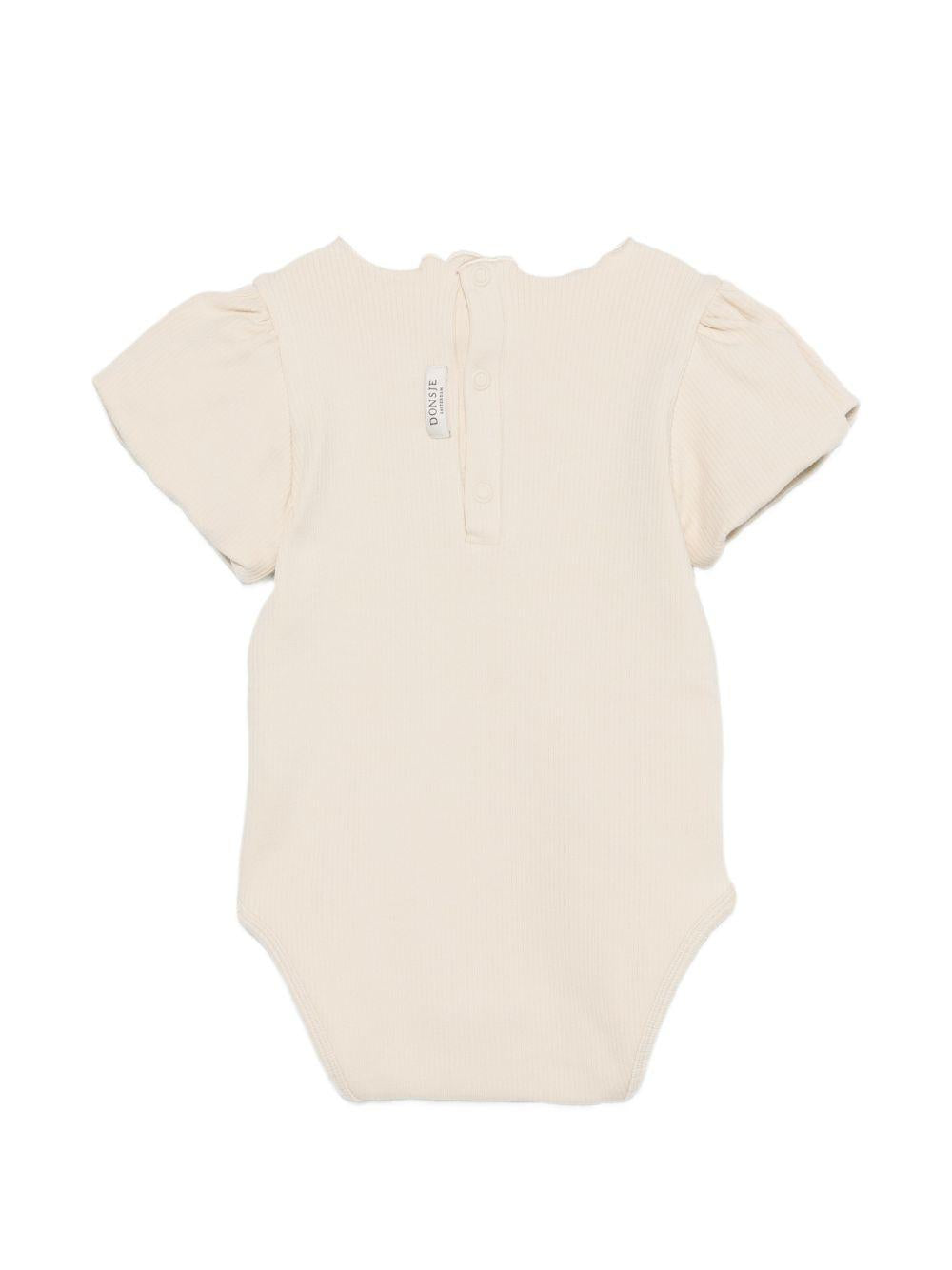 Tutina per neonata Donsje beige con dettaglio fiore sul davanti 3032705 00004 DONSJE KIDS 