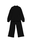 Tuta per bambina Moschino Kids nera con stampa grafica sul petto HDK038LCA52 60100 MOSCHINO KIDS 