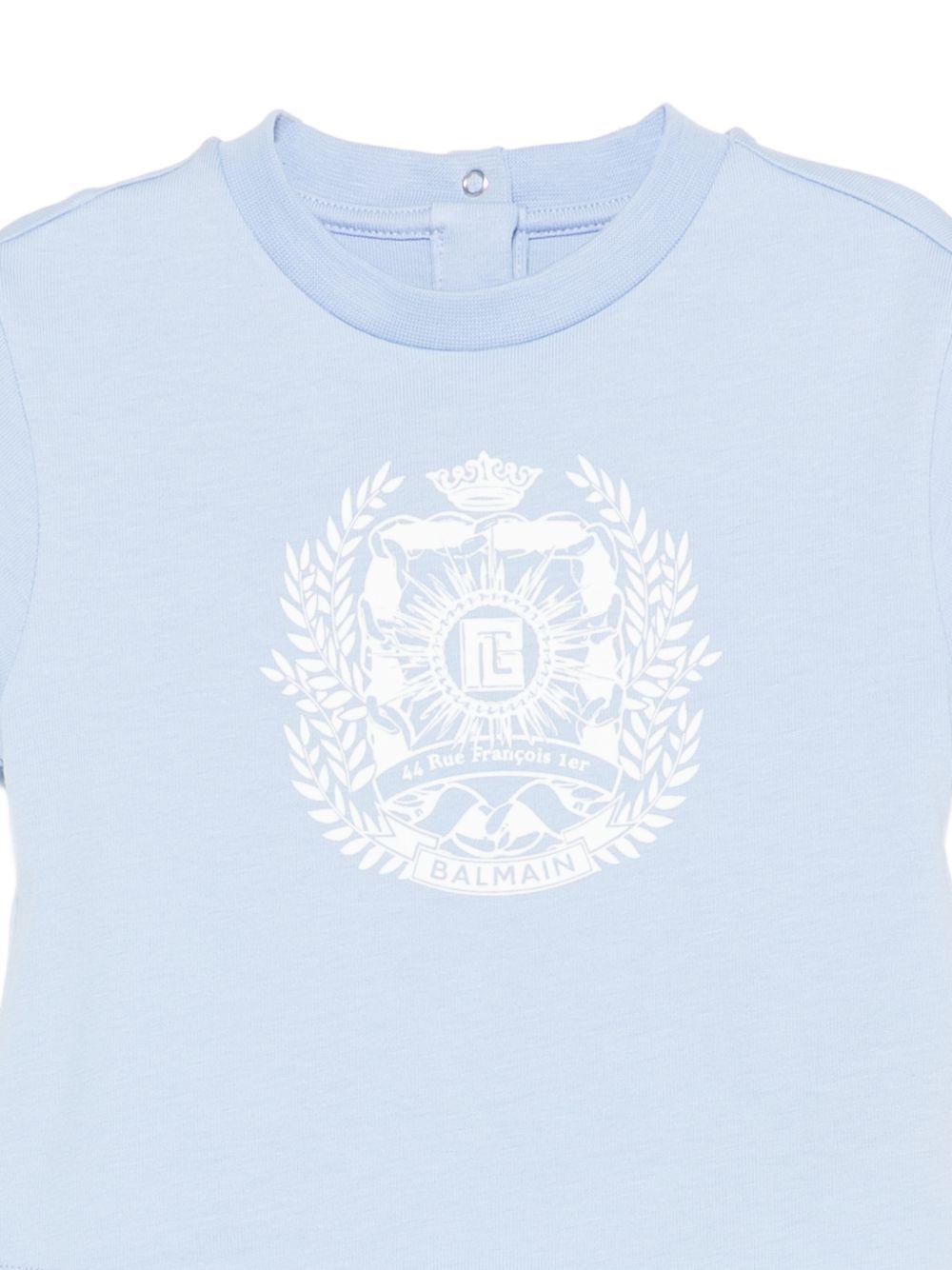 T-shirt da neonato Balmain Kids azzurrro con stampa grafica sul davanti BY8541 Z3672 652BC BALMAIN KIDS 