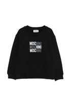 Felpa per bambini Moschino Kids nera con logo sul davanti HRF078LCA32 60100 MOSCHINO KIDS 