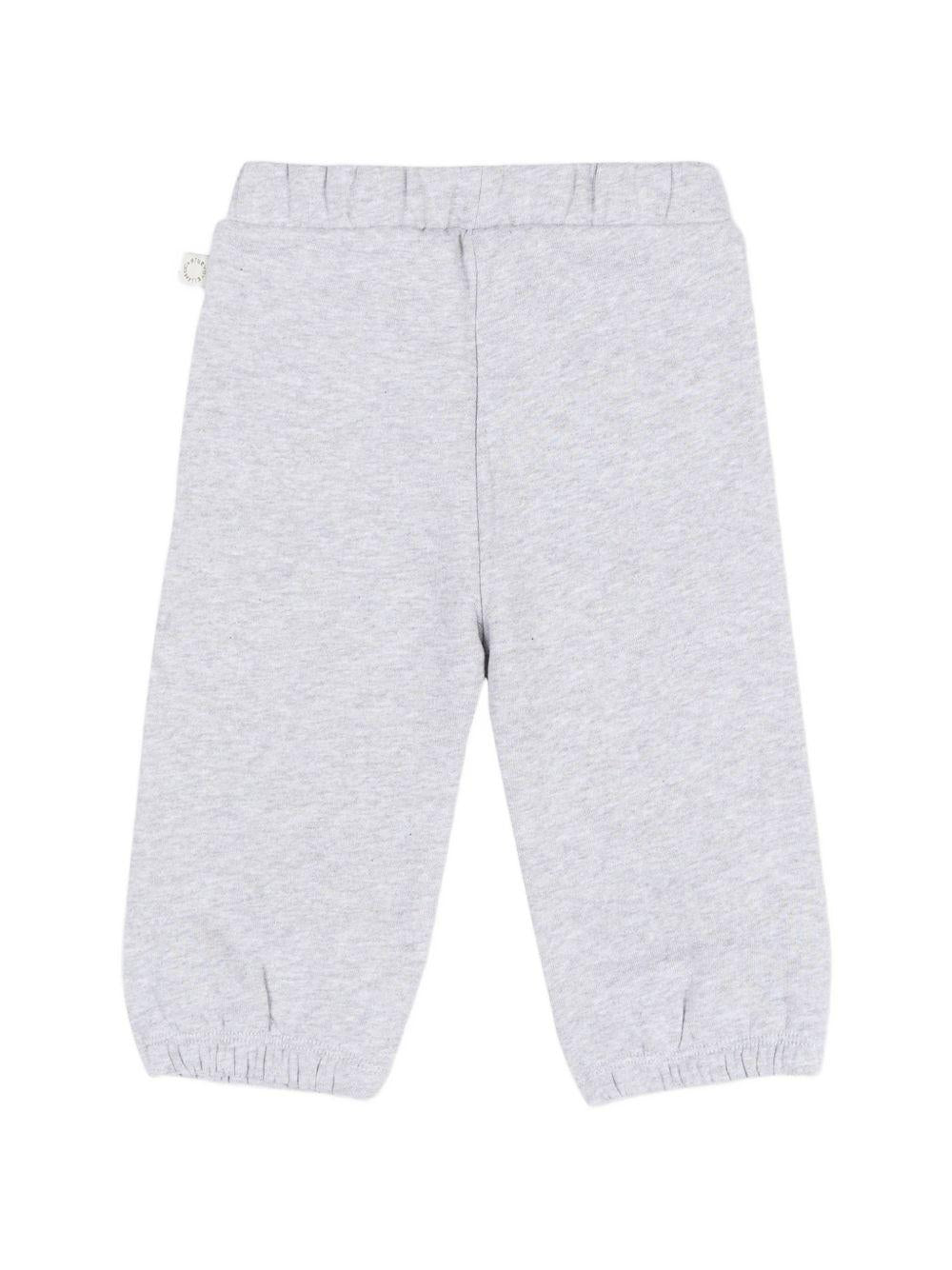 Pantaloni sportivi per neonato Stella McCartney Kids grigi con stampa grafica sul davanti TZ6300 Z4016 807 STELLA McCARTNEY KIDS 