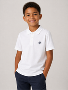 Polo per bambino Timberland Kids bianca con logo sul petto T60823 10P TIMBERLAND KIDS 