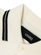 Polo per bambino Amiri Kids bianca con ricamo logo AKJYPO1010 127 AMIRI 