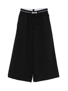 Pantaloni per bambina MSGM Kids neri con dettaglio logo F5MSJUPA275 110 MSGM KIDS 