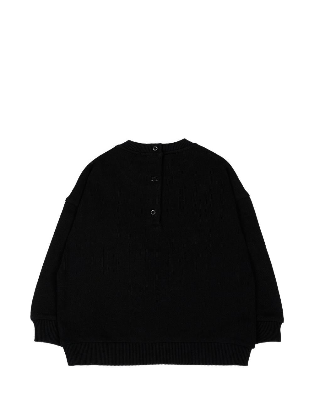 Maglione per neonato Balmain Kids nero con slogan stampato sul davanti BZ4360 Z3183 930BC BALMAIN KIDS 